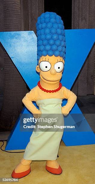 LOS ANGELES, CA - APRIL 25:  The Simpsons character Marge Simpson attends "The Simpsons" 350th episode block party on the New York street of Fox Pico Lot on April 25, 2005 in Los Angeles, California.  (Photo by Stephen Shugerman/Getty Images)